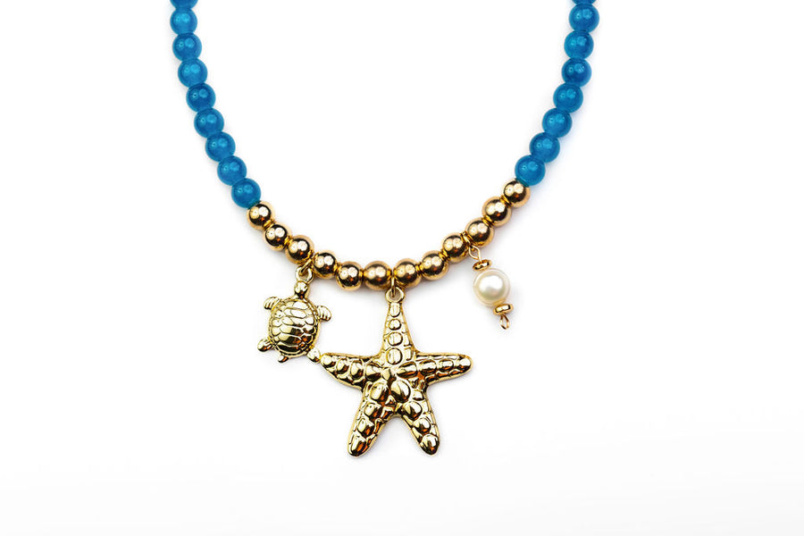 Collar Chicona estrella de mar , perla y tortuga