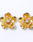 Aretes Flor Dorada con Zirconia en Centro