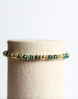 Pulsera dorada cristales verdes