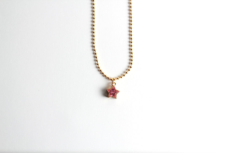 Collar dorado dije estrella rosa