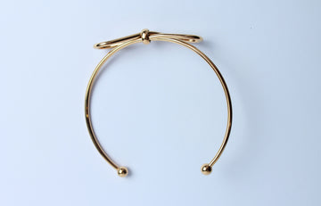 Brazalete ajustable moño