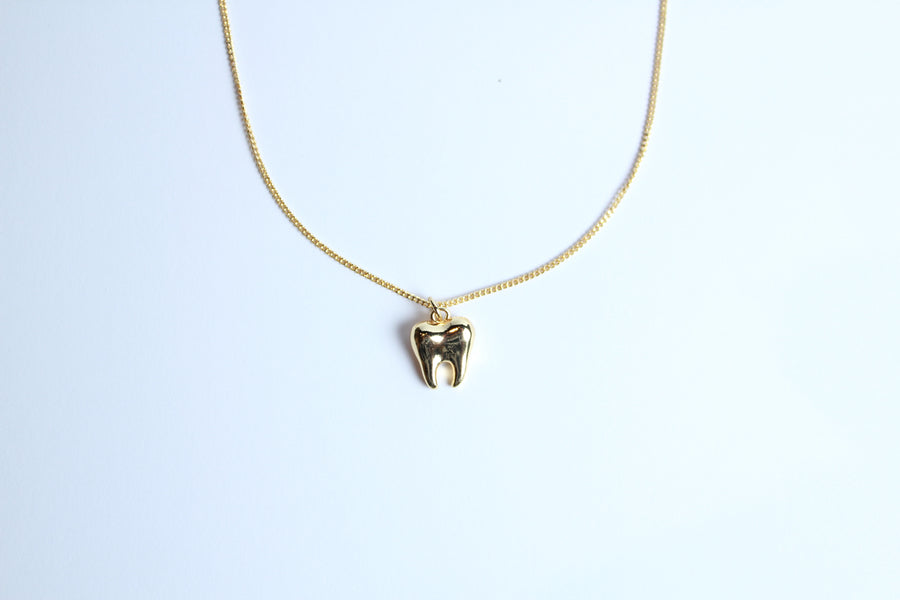 Collar muela dorada