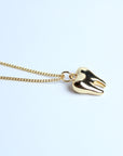 Collar muela dorada