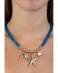 Collar Chicona estrella de mar , perla y tortuga
