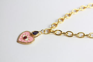 Collar dorado con corazón y ojo turco rosa