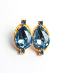 Aretes dorados con cristal azul cobalto