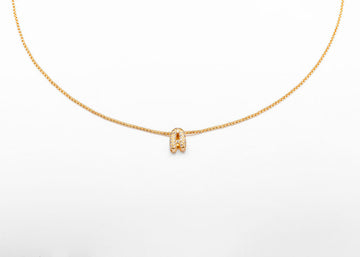 Collar inicial doradas con zirconias