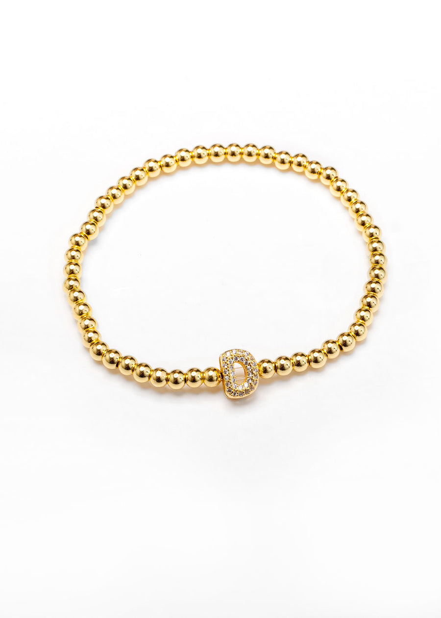 Pulsera inicial dorada