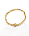 Pulsera inicial dorada