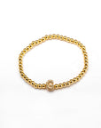 Pulsera inicial dorada