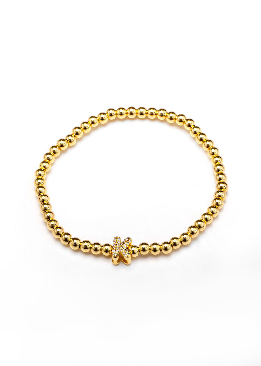 Pulsera inicial dorada