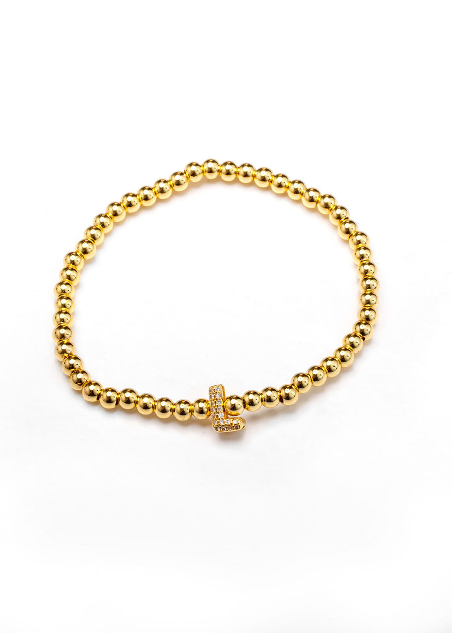 Pulsera inicial dorada