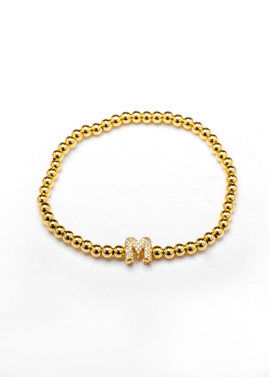 Pulsera inicial dorada