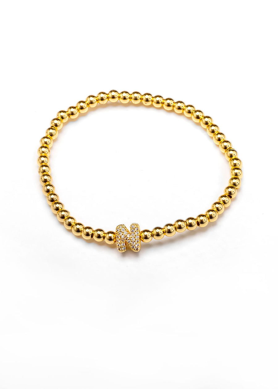 Pulsera inicial dorada