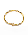 Pulsera inicial dorada