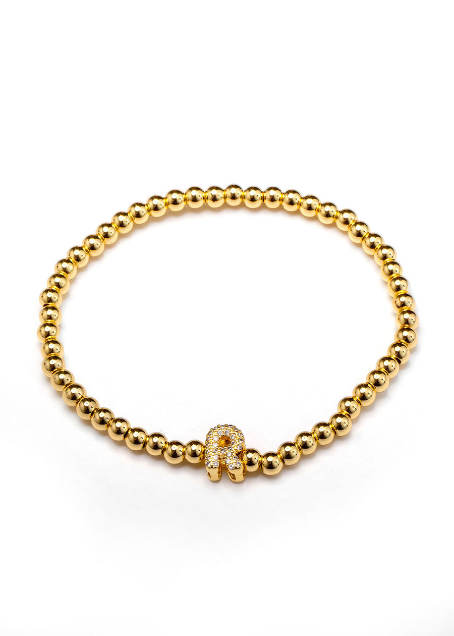 Pulsera inicial dorada