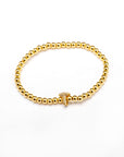 Pulsera inicial dorada