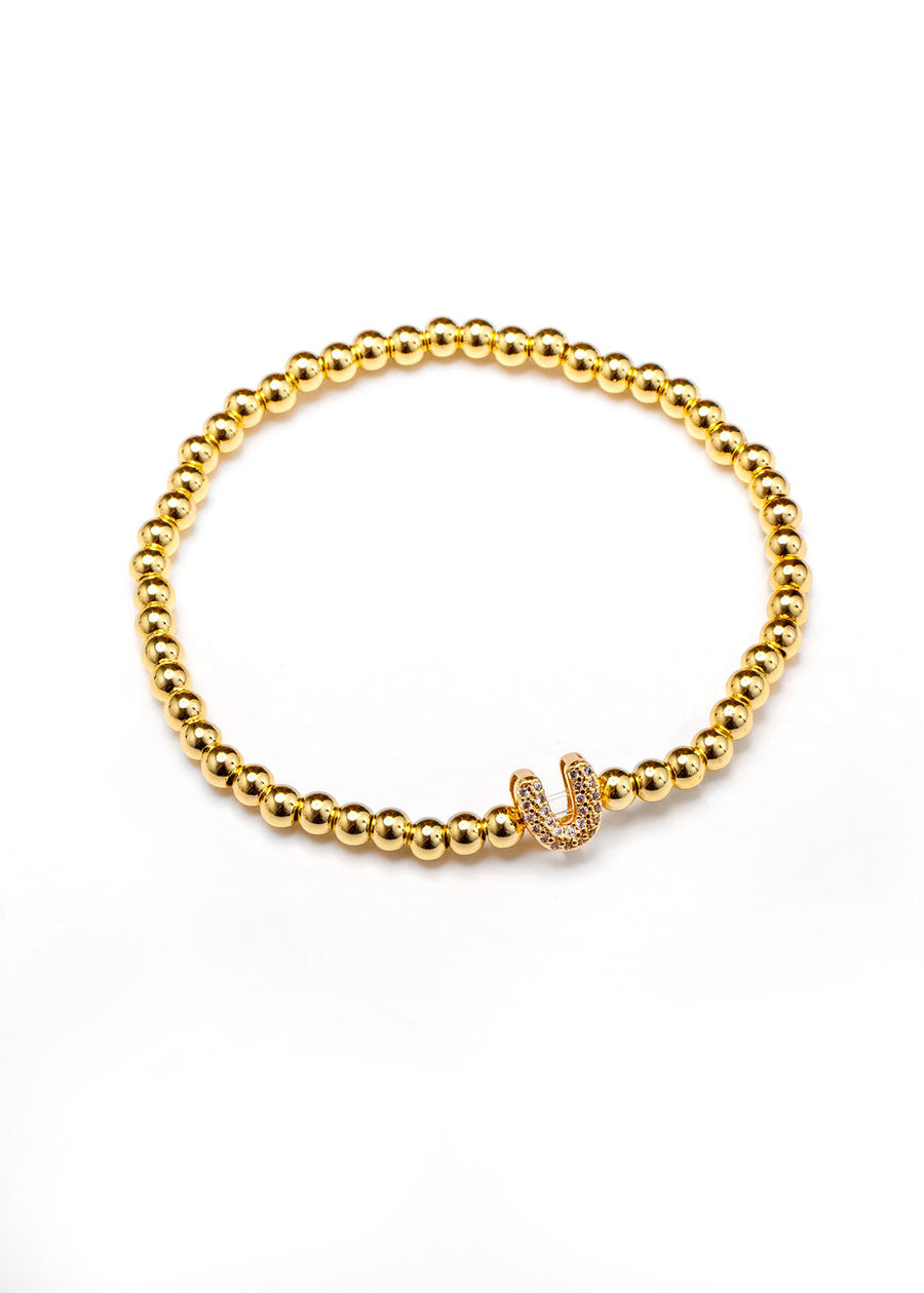 Pulsera inicial dorada