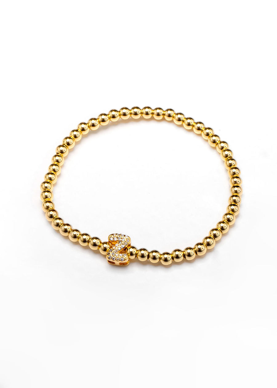 Pulsera inicial dorada